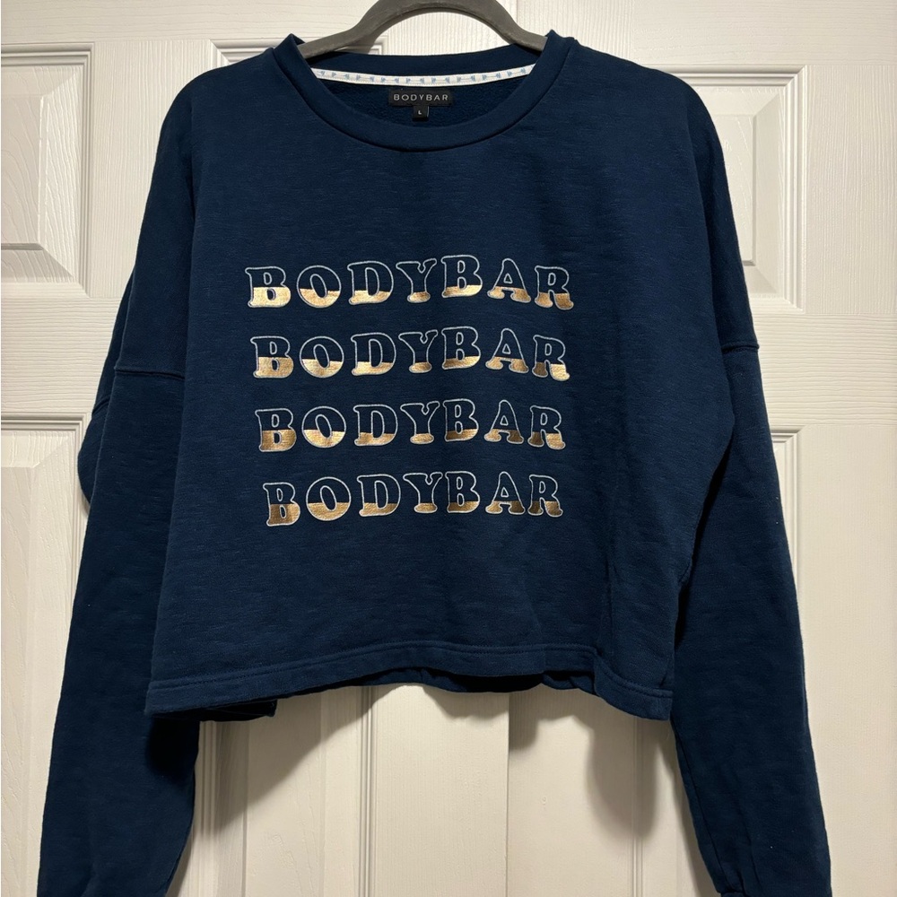 BODY BAR PILATES SWEATSHIRT 

EMBRACE THE SHAKE AND YOUR INNER HOT PILATES GIRL